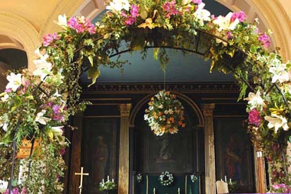 floral arch in church